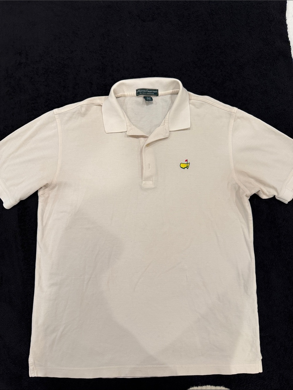Cream Short-Sleeve Polo with Yellow & Red Embroidered Golf Motif